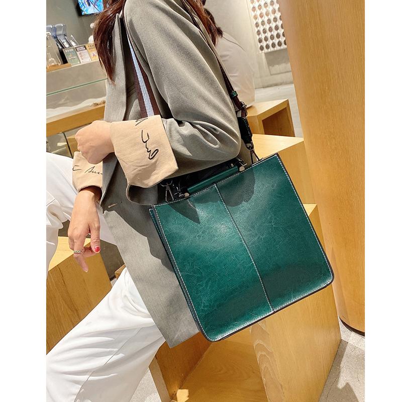 Bolsos de cuero auténtico para mujer, bolso de mano de lujo con cremallera, bolsos de mano de piel de vaca, bolso bandolera de diseñador