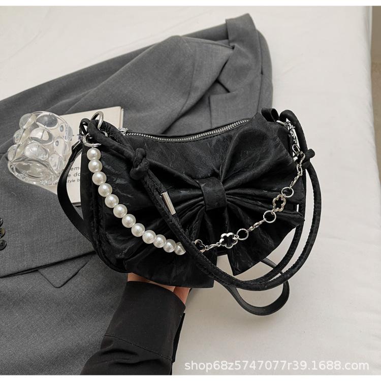 Foreign bow niche casual shoulder bag 2025 new fashion shoulder armpit bag simple casual handbag