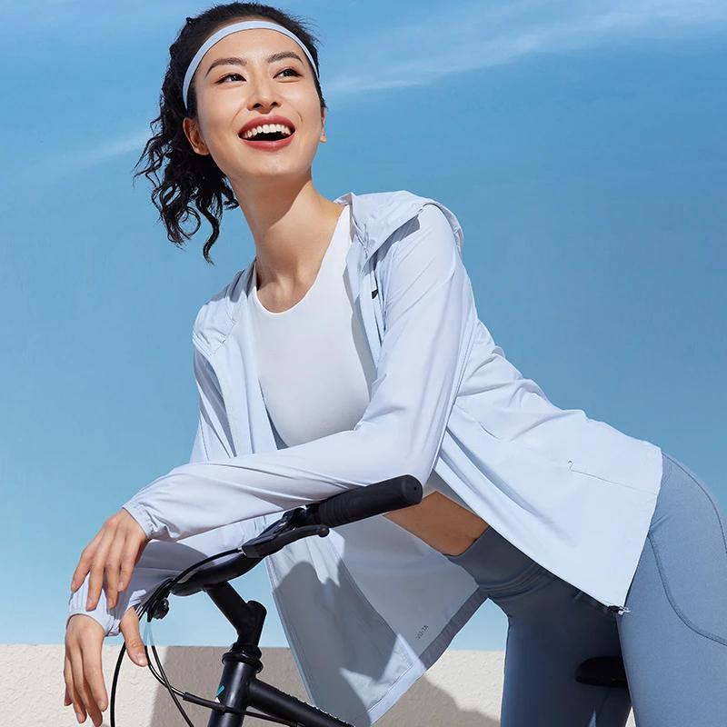 Li Ning Jednobarevná bunda s kapucí na zip a dlouhým rukávem s ochranou proti slunci dámská bunda nebesky modrá AFDT182-9