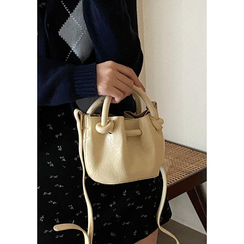 

Portable and Fashion K-style Versatile Bucket Bag Milk yellow