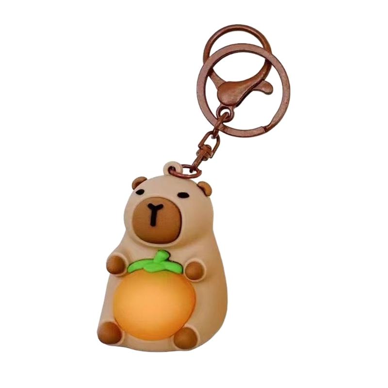 Glowing Capybara Keychain Soft PVC Animal Designs Capybara Hugging Orange Keyring Easy Carry Cute Keyring Accessory