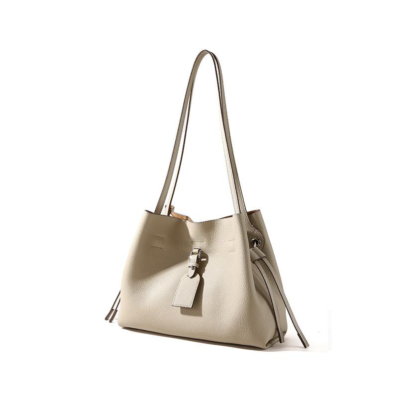 

Leather women s bag 2025 new fashion trend shoulder bag niche design bag high-end sense large capacity mother and child bag