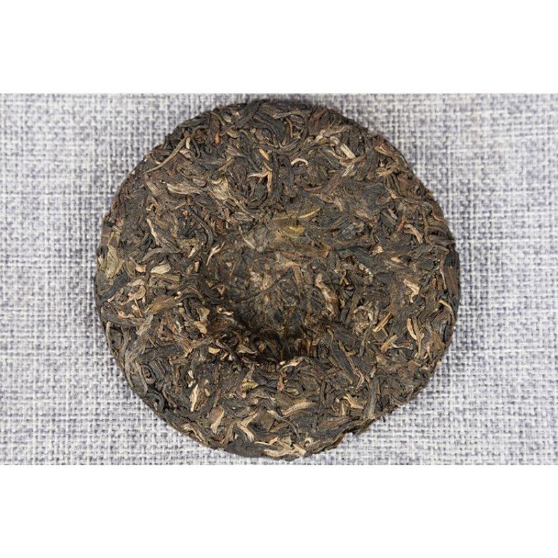Yunnan Pu'er Tee Frühlingstee Roh Tee 100g Kuchentee Isländischer Roher Kuchentee