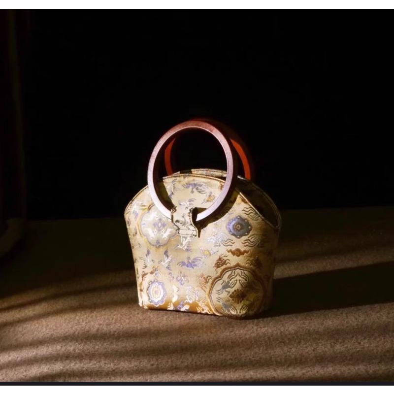 

Ring wooden handle crane deer Tongchun retro fortune ingot bag shell bag design sense new Chinese style handbag women