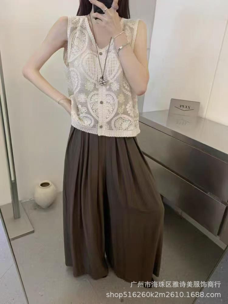Foreign-style versatile hook flower hollow vest women's summer new V-neck high-end sleeveless stacked loose top