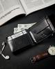Compact black wallet made of high-quality genuine leather with RFID protection - Rovicky