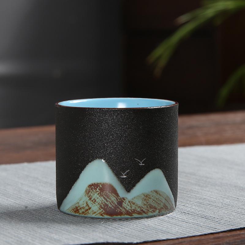 Hand-Painted Black Pottery Zen Tea Cup - Retro Mountain Design, Kung Fu Ceramic Masterpiece for Tea Tasting and Guest Reception.