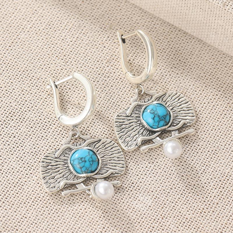 Exquisite Kreative Synthetische Türkis Imitation Perlen Eingelegte Unregelmäßige Anhängerohrringe für Damen Schmuckzubehör