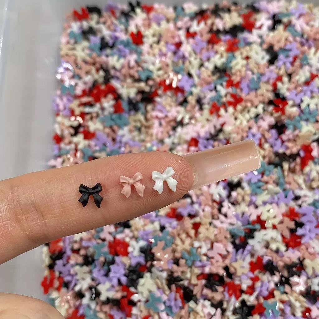 50pcs Transparent Bow Nail Art Parts Charms Bulk Shiny Mini Resin Ribbon Nail Rhinestones DIY Summer Nail Art Decor Accessories