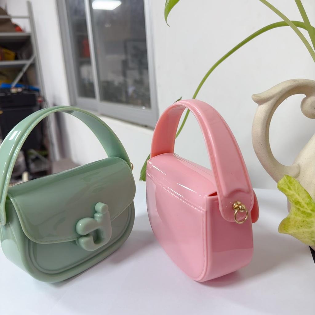 New Hot-selling J-letter Jelly Bag Portable Shoulder Oblique Span Children's Bag PVC Bag Change Bag