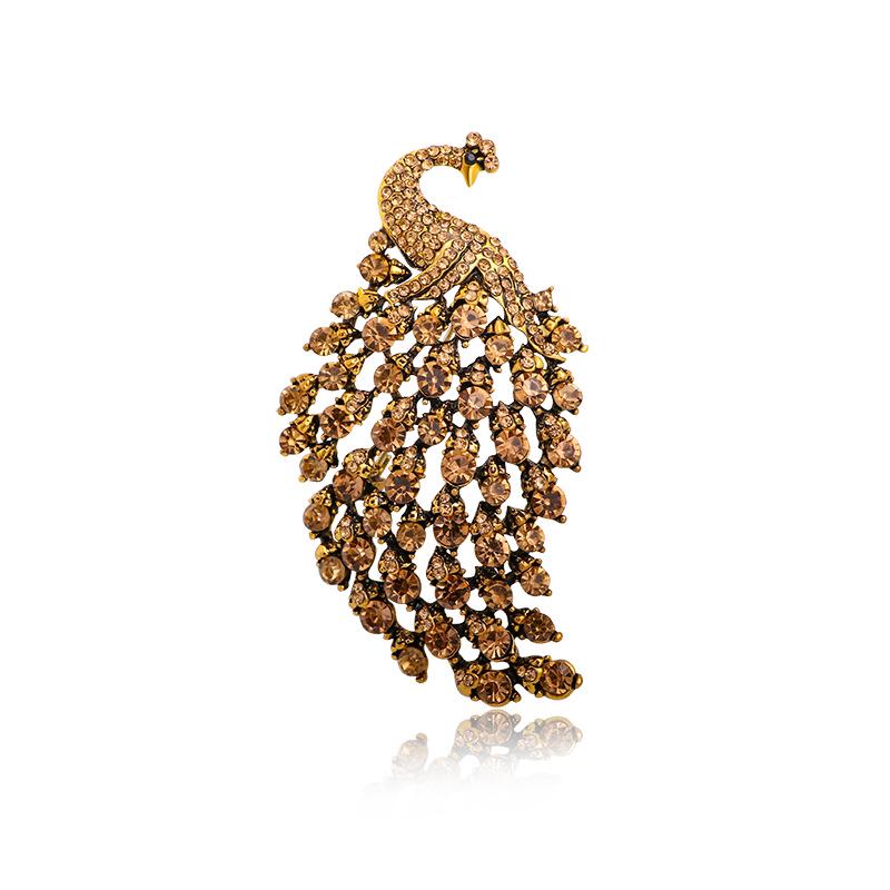 Bunte Pfau-Brosche - Diamantenbesetztes Modeaccessoire für Damen