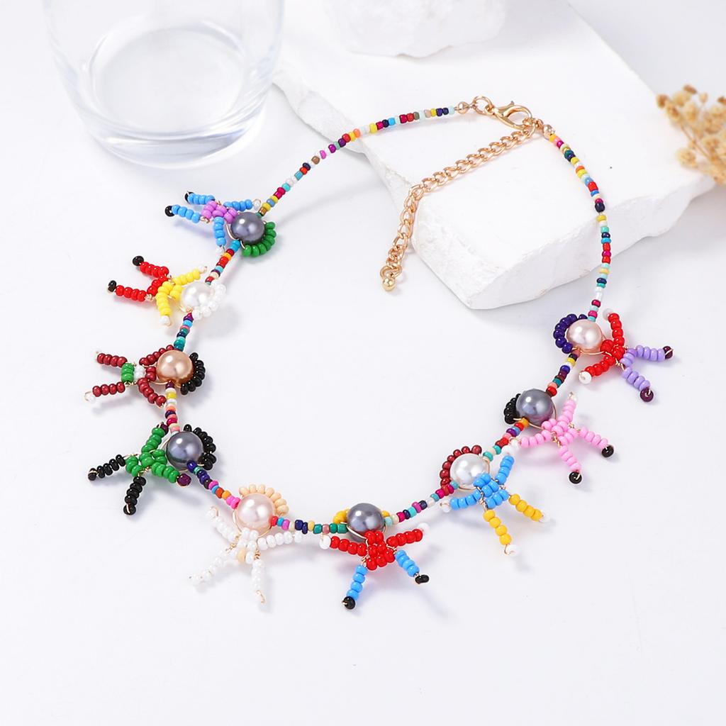 Niche Unique Creative Design Sense Hand-woven Cartoon Three-dimensional Villain Imitation Pearl Female Collarbone Chain