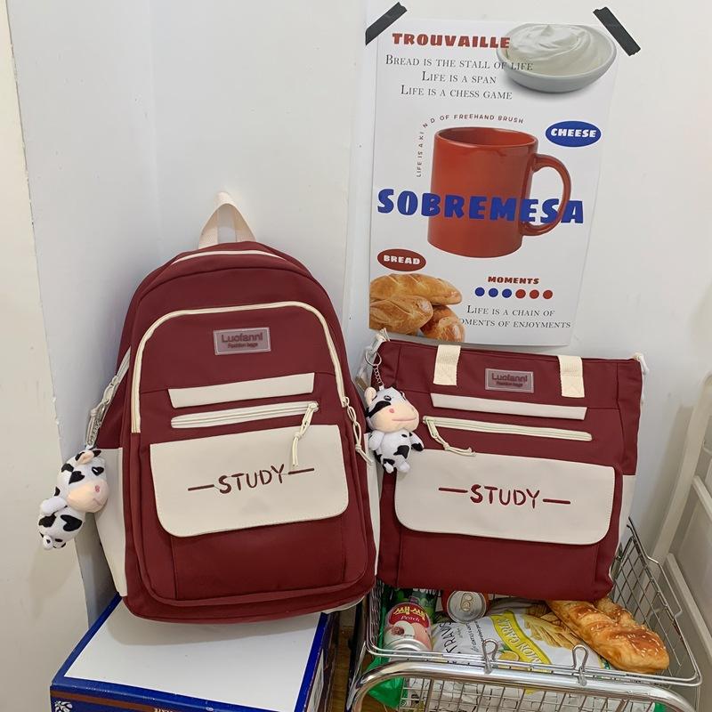 Junior high school student schoolbag female large capacity high school student simple fashion trend backpack primary school backpack