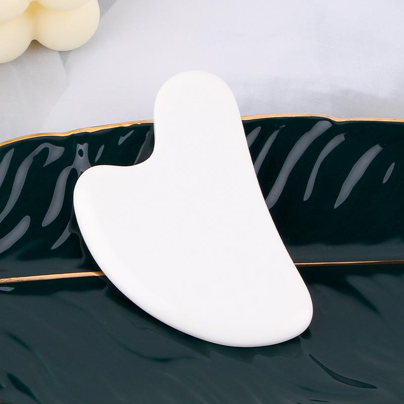 Rose Quartz Heart-Shaped Facial Massage Tool with Red Triangle Meridian Stick