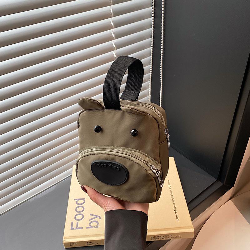 Three-color patch small bag female new dog change handbag cartoon cute student hand mobile phone bag versatile