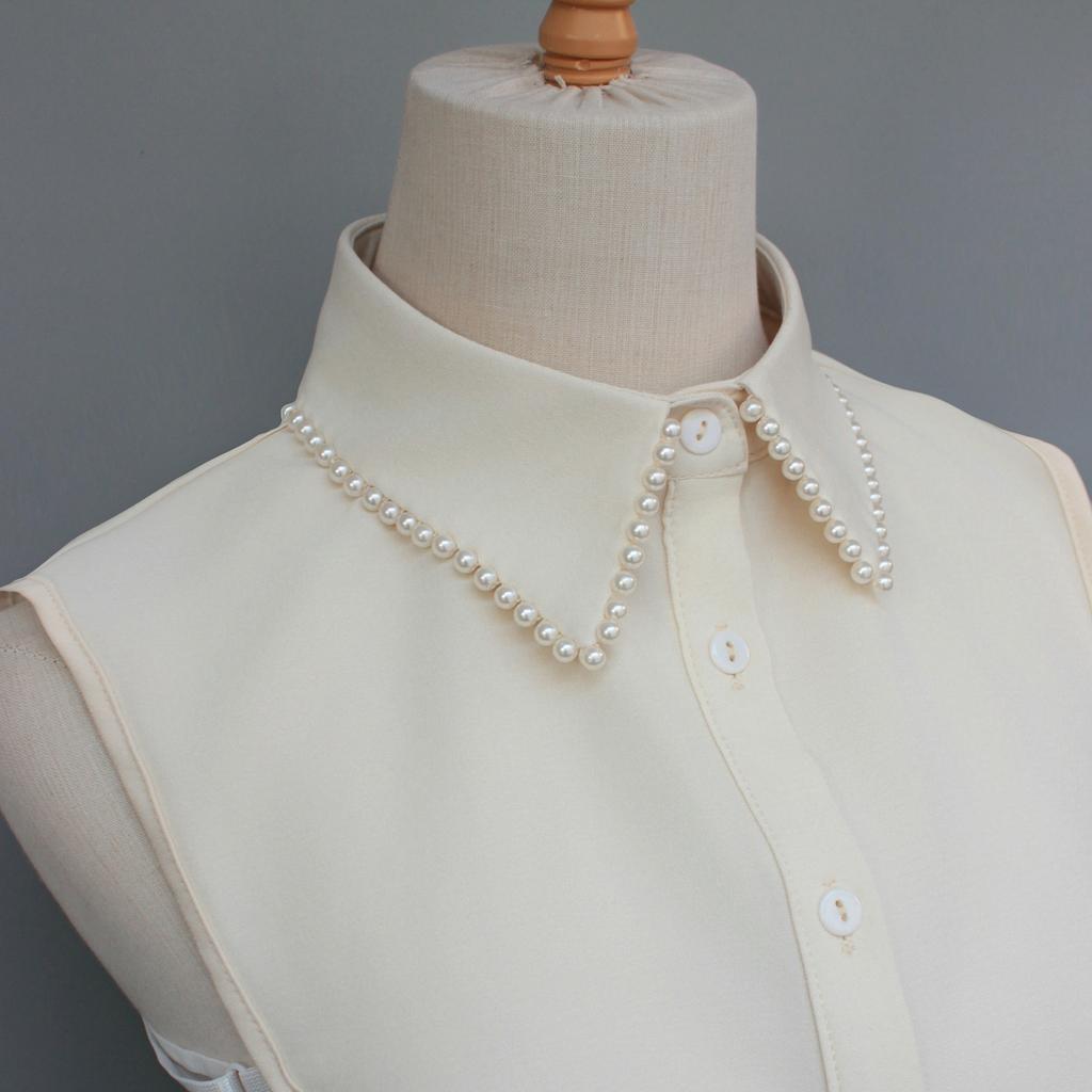 Exquisite fake collars with hand-sewn pearl embellishments. These decorative collars are unique, versatile, and detachable. The