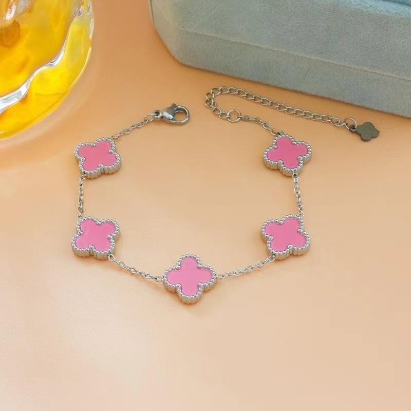Bracciale da donna a fascia con conchiglia double-face e quadrifoglio, resistente ai colori, alla moda e di alta gamma