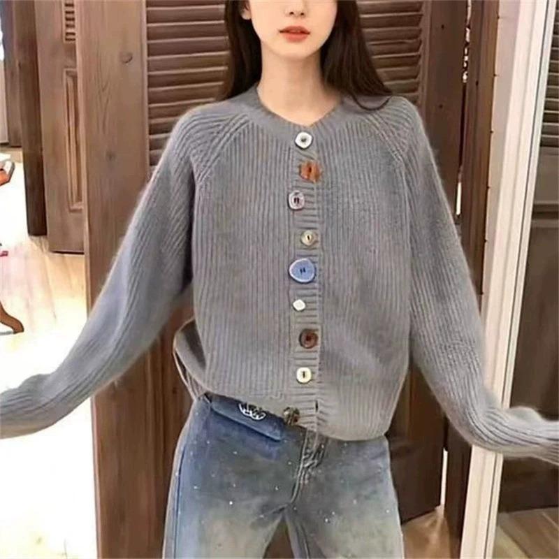 Design sense niche irregular color button knitted cardigan women's autumn and winter new age-reducing gentle wind sweater jacket