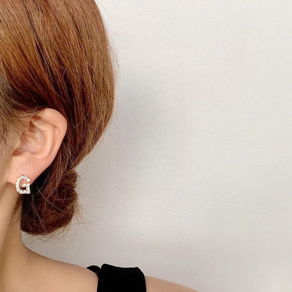 Korean Micro-Diamond Trendy Letter Stud Earrings: Elegant, High-End Accessories for Women's Unique Style.