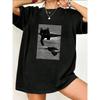 Oversize Women's Short-Sleeve T-Shirt with Black Cat Peeking Through Hole On Black-and-White Striped Background Print