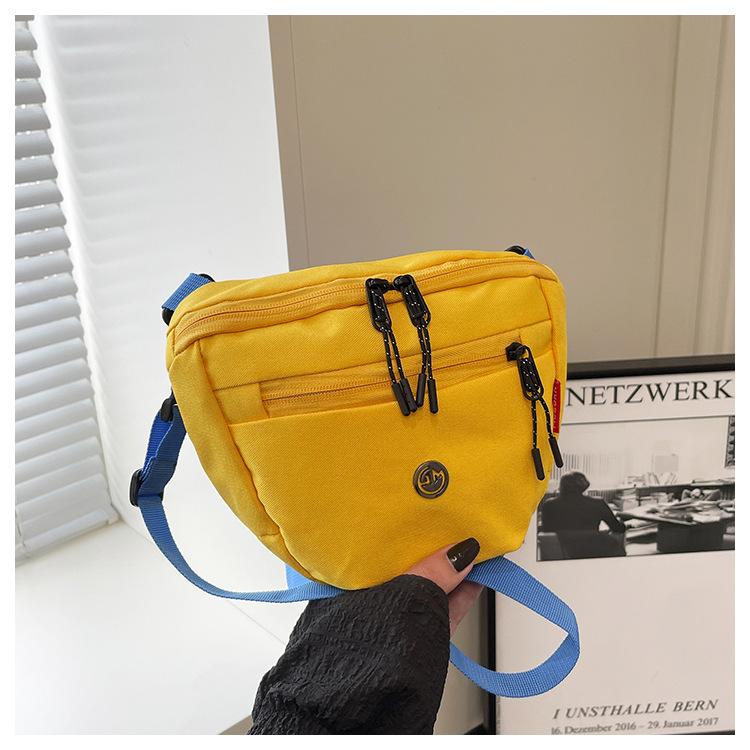 

Canvas bag women s summer new fashion messenger bag contrasting color niche design bucket bag жовтий