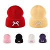 Korean Cute Bow Knit Hat - Versatile, Warm, Solid Color for Spring & Autumn, with Ear Protection.