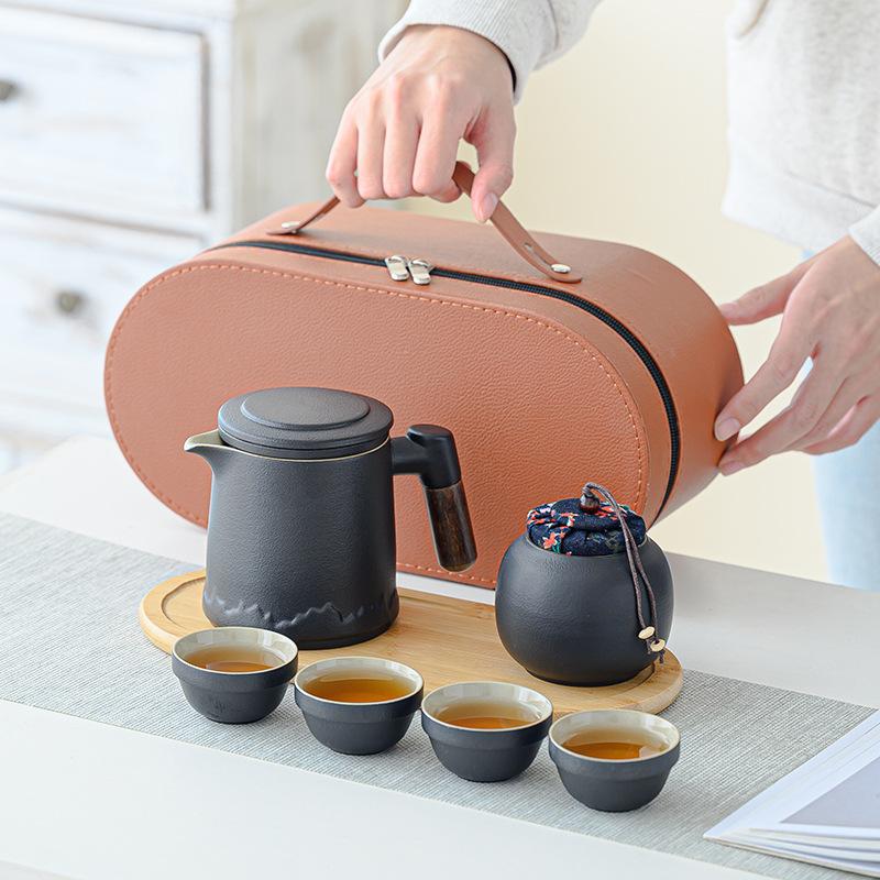 Ceramic Travel Tea Set, Portable Bag, Express Cup, One Pot, Four Cups, Tea Can, the Whole Set of Kung Fu Tea Set, Mountain Language Cup.
