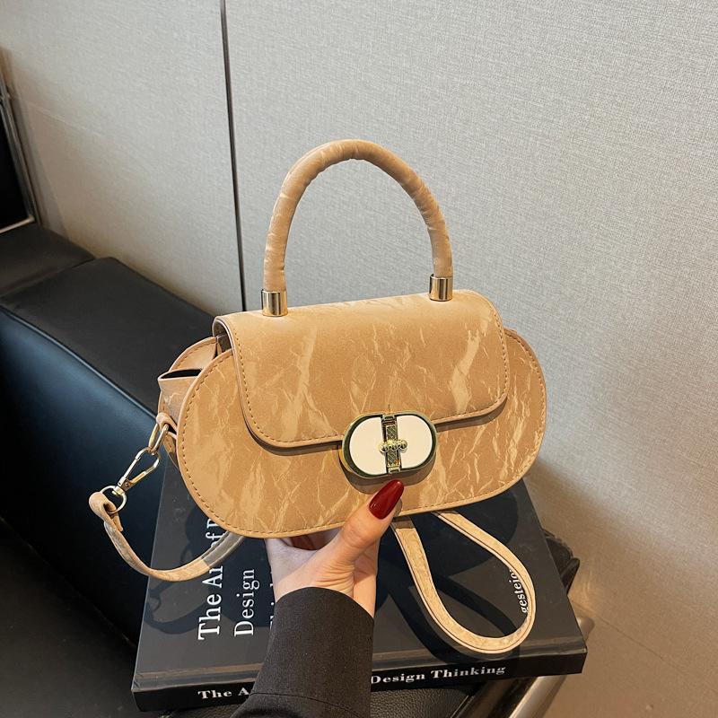 

High sense fashion portable small bag women 2025 new Korean version niche commuter bag popular versatile messenger bag