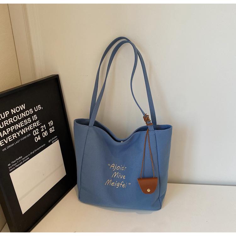 

2025 new ins wind canvas tote bag large capacity shoulder bag Japanese lazy wind class commuter bag синий