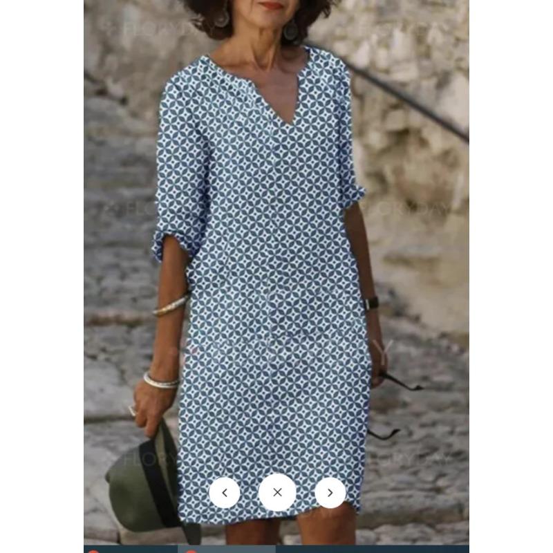 Damska sukienka z nadrukiem z dekoltem w serek