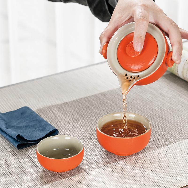 Japanese-style handmade ceramics, one pot and two cups of travel tea set, outdoor portable express cup storage design, simple tea brewer