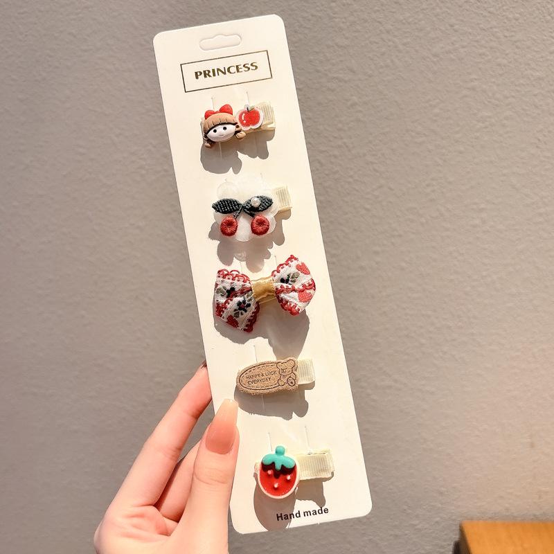 Bedårande babyvänliga luddiga hårklämmor för barn