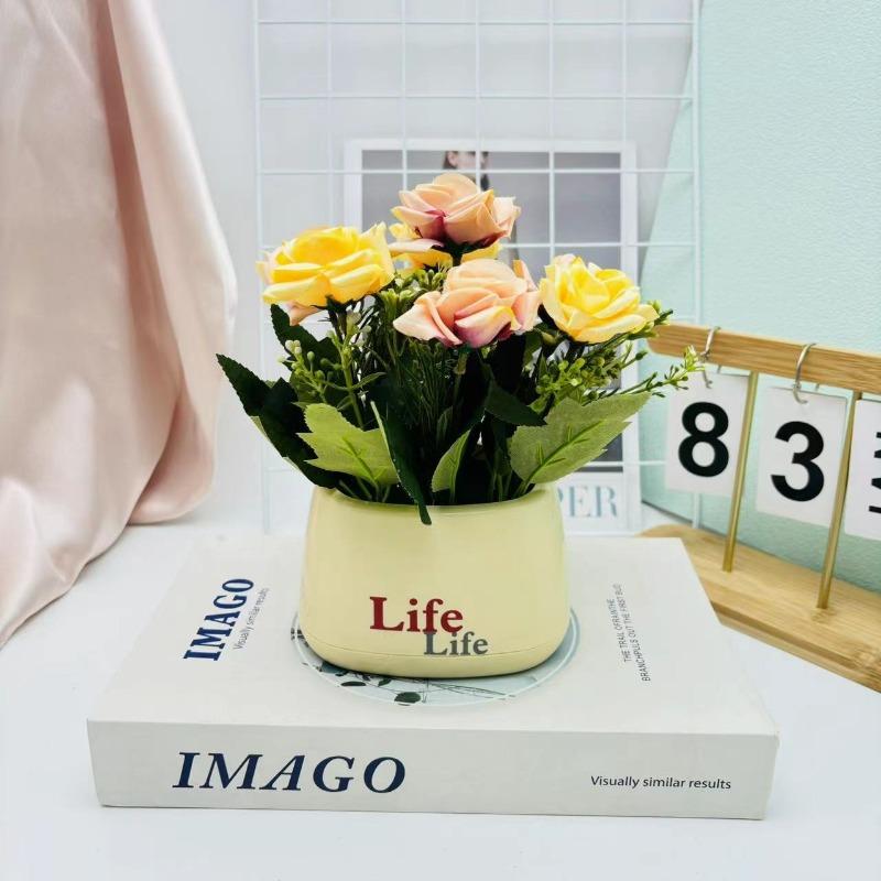 

Искусственные цветы бонсай розы, горшечные растения и зеленые растения можно использовать для украшения как внутренних, так и наружных помещений дома. шампанского