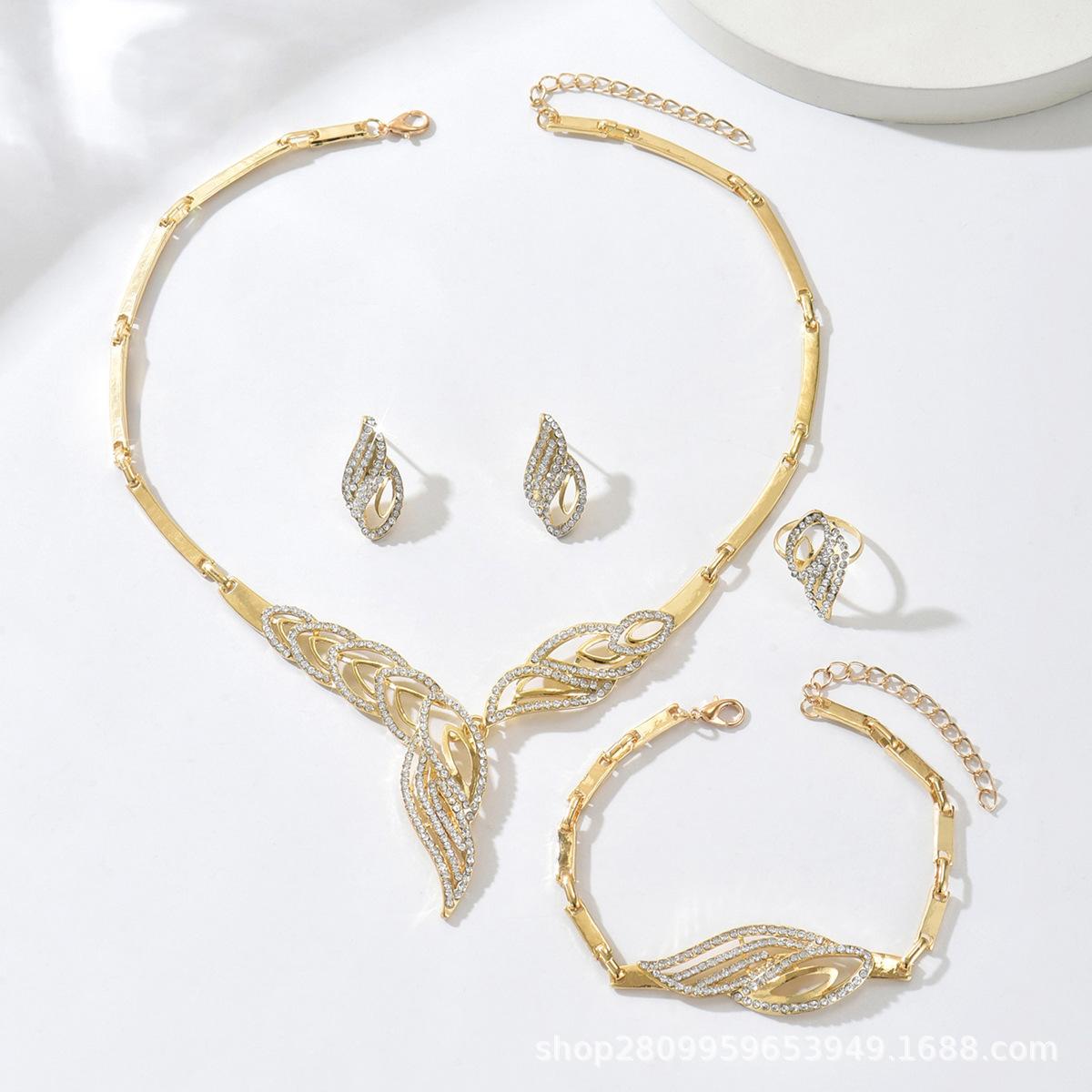 

Ближневосточная мода Ожерелье с золотым листом, инкрустированное бриллиантами, Серьги, Кольцо, Браслет Набор из четырех аксессуаров Женский Свадебный