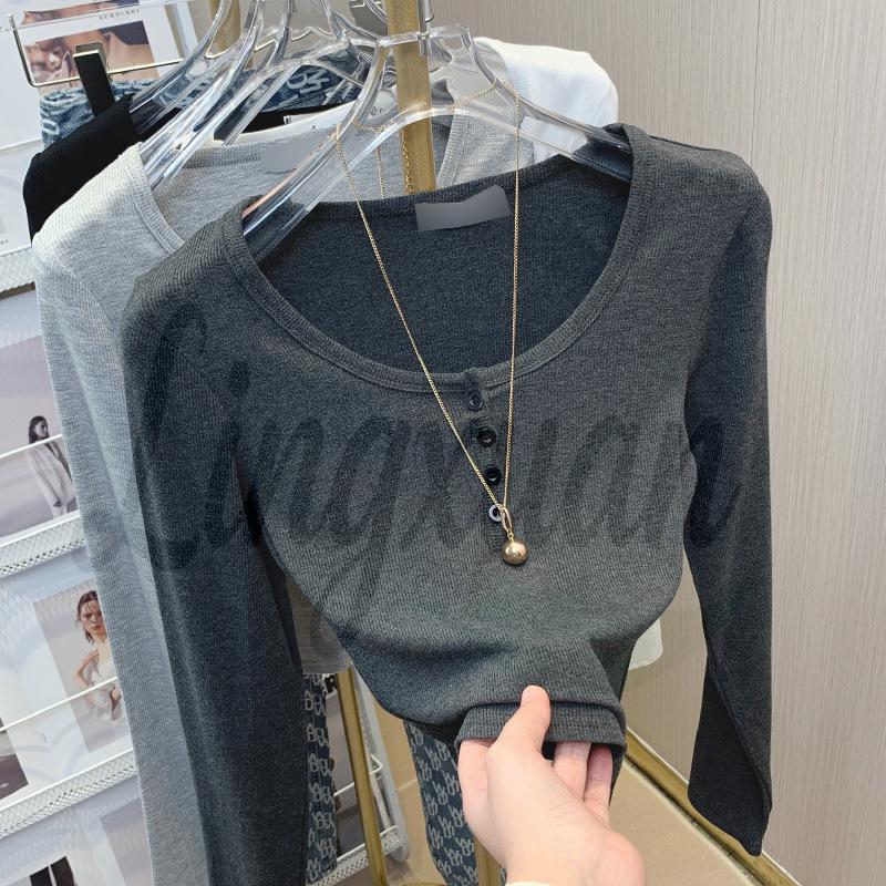 

Women s Slim-Fit Ribbed Long-Sleeve Top: Low-Neck, True Shoulder, Autumn/Winter 2026, Pure Desire Collection. Large темно-серого