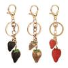 Eleganter Robuster Erdbeeren-Taschenanhänger Konstruktion aus Harz- und Metallmaterialien Mehrfach verwendbares Modeaccessoire für den täglichen Gebrauch