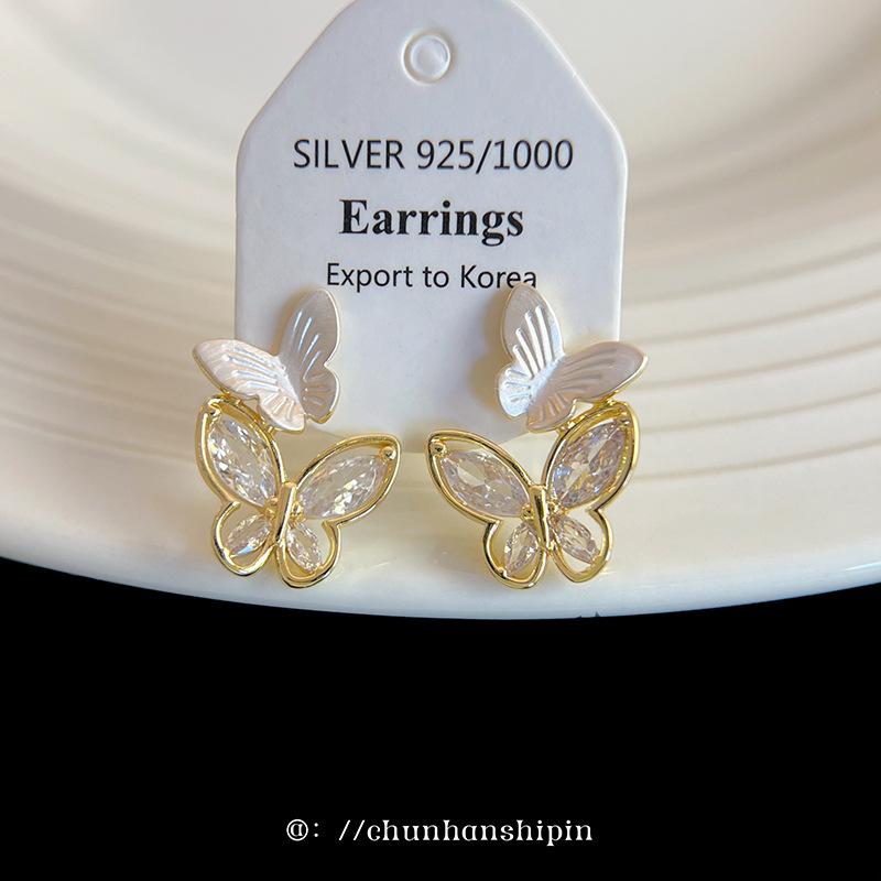 

Double butterfly ear clips, advanced sense, no ear piercings, exquisite spring and summer fresh girlish temperament,mosquito coil disc earrings.
