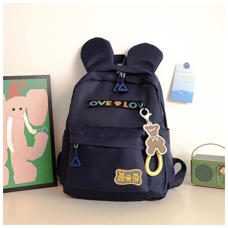 

New boys and girls cute backpack lightweight large capacity kindergarten bag high value cartoon girl backpack темно-синього кольору