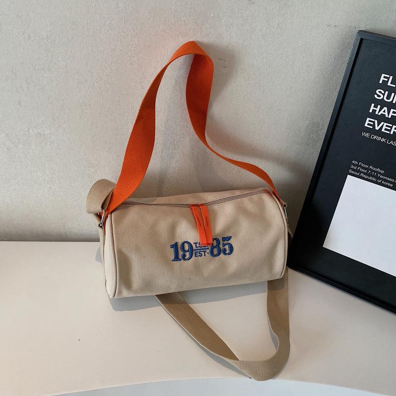 

Simple bag 2025 new cylinder bag women s bag messenger bag canvas bag Oxford cloth casual small shoulder bag trend хаки