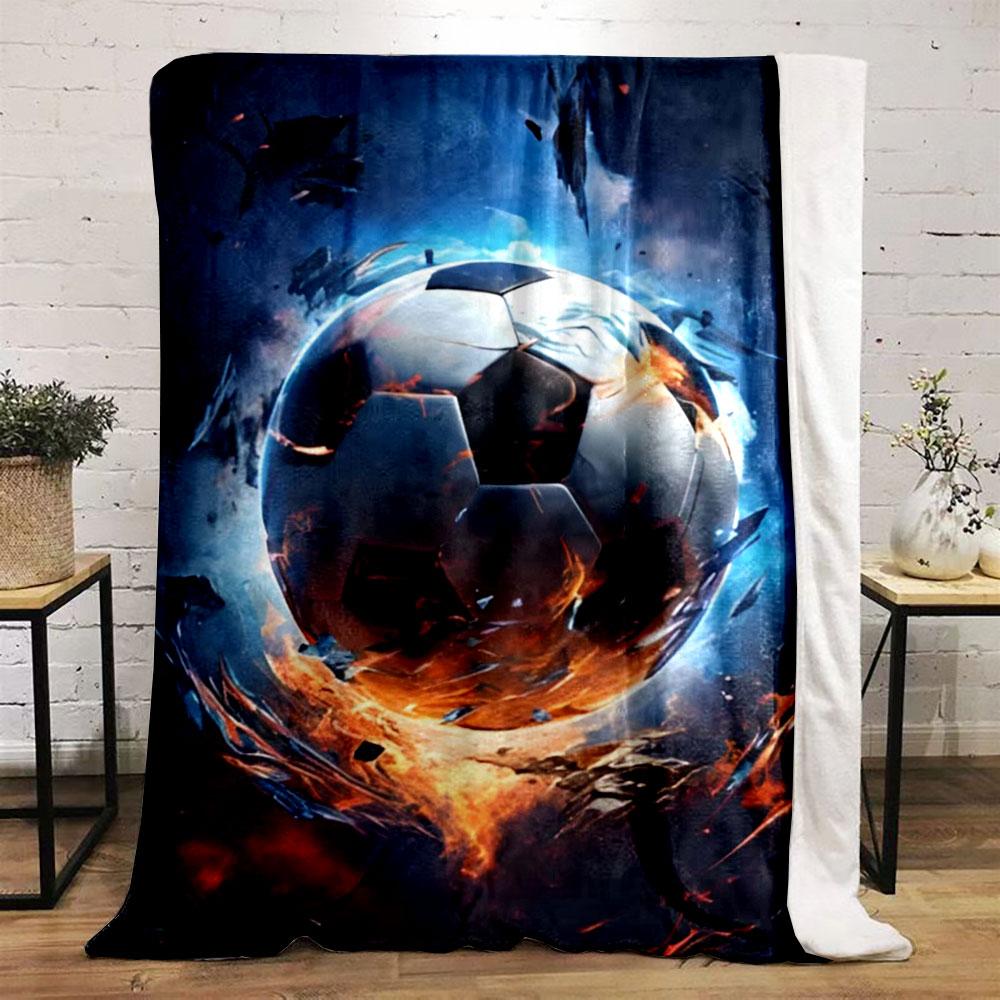 A Fiery Soccer Ball Surrounded by Intense Glowing Flames and Debris. for All Seasons Blanket Lunch Break Throw Gift