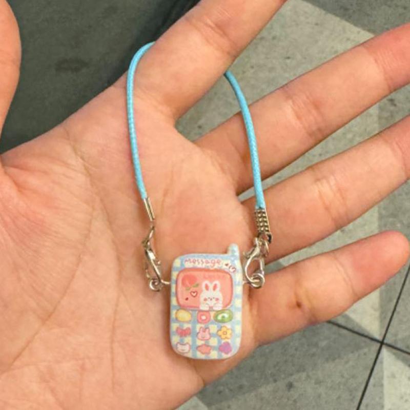 

Аксессуары для кукольного домика Маленькие животные Миниатюрная модель мобильного телефона Подвеска Мультяшная модель мобильного телефона Подвески Игрушка-наряд