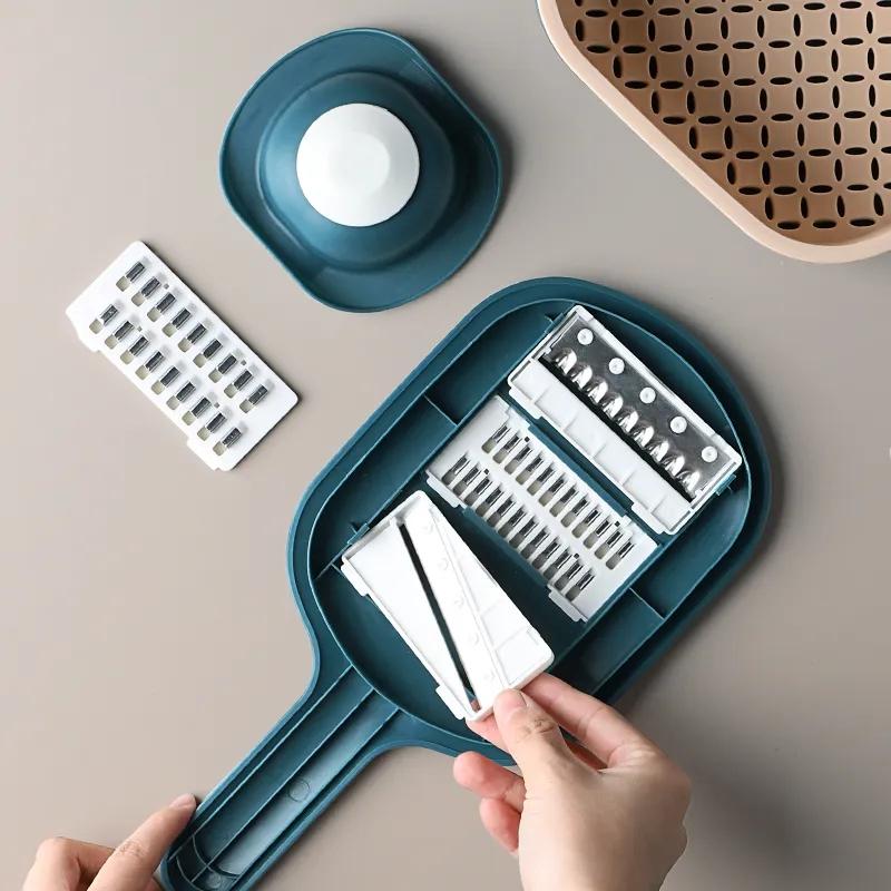 Forniture da cucina Tagliaverdure multifunzione Grattugia per artefatti Patatine fritte Tritatutto domestico Cestello di scarico Macchina affettatrice per pomodori e carote Tritatutto