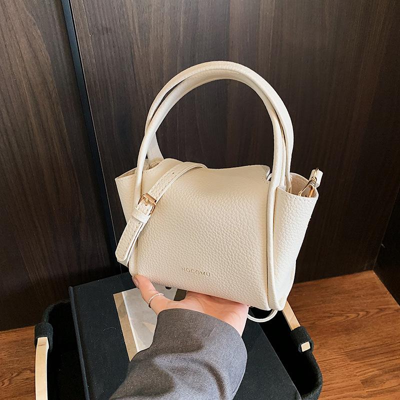 Spring women's bag niche high-end handbag 2025 new simple vegetable basket bag versatile shoulder messenger bag