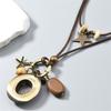 Western Styles Long Chain Necklace Artisanal Crafted Wax Cord Alloy Pendant Wooden Bead Accents Retro Fashion Accessory