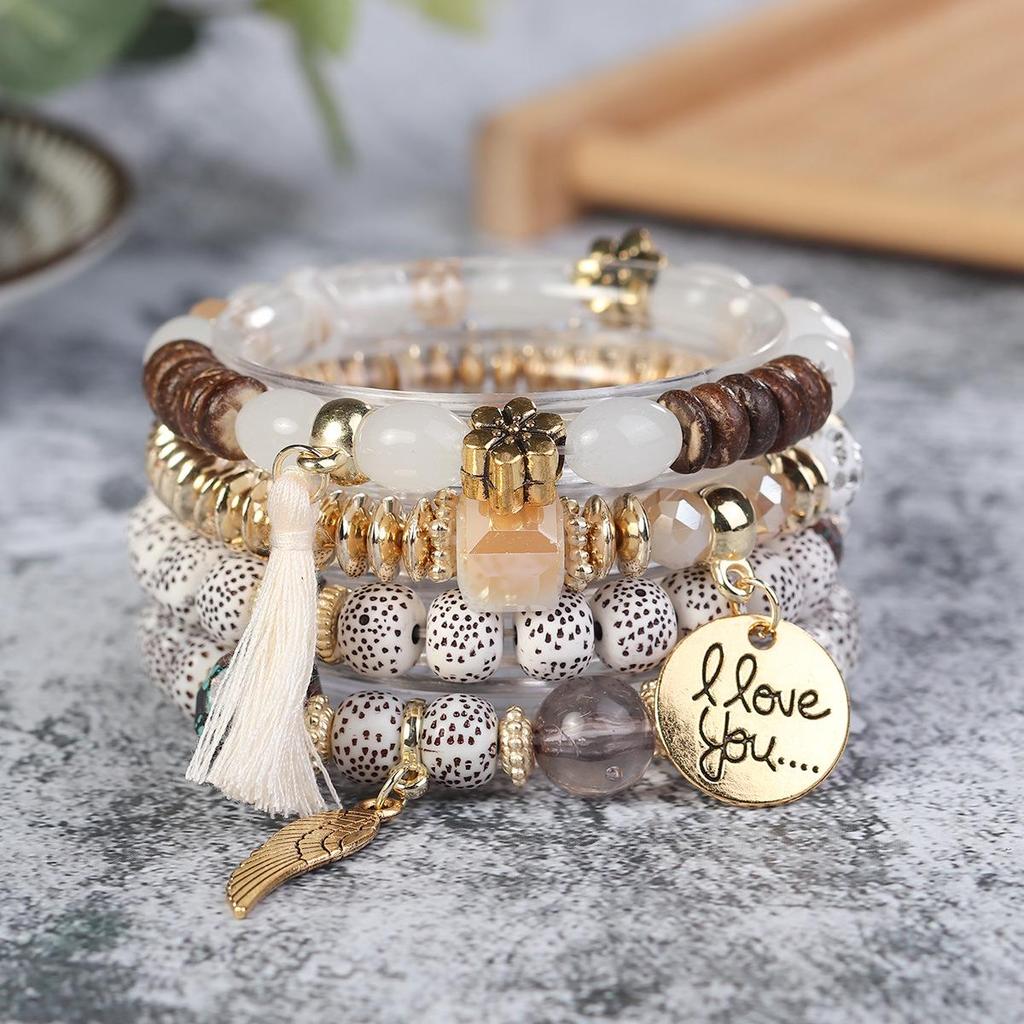 Bohemian Trendy Bracelet with Wings, 'I Love You' Tassel Pendant, and Retro Creative Design