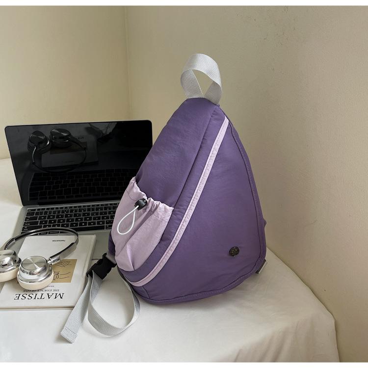 

Casual outdoor cycling small bag women s 2025 new Korean version of lightweight canvas chest bag men s and women s crossbody bag trend фиолетовый