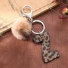 Western Cowboy Leopard Print Leather Keychain with Acrylic Letter and Plush Ball Accessories