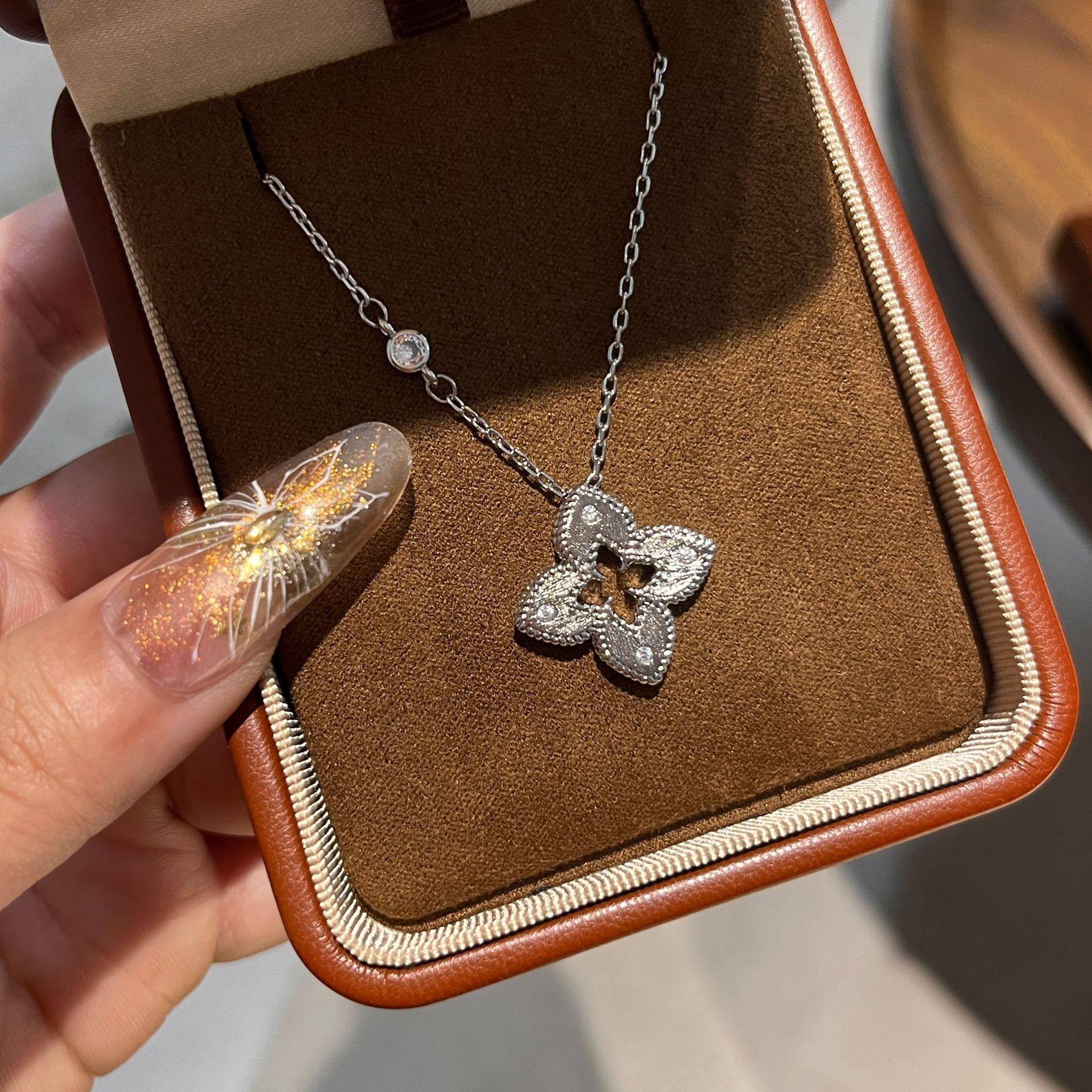 Brushed Cloth Wind Four-Leaf Flower Necklace Female Heavy Industry Hollow Micro-Inlaid Four-Leaf Clover Collarbone Chain