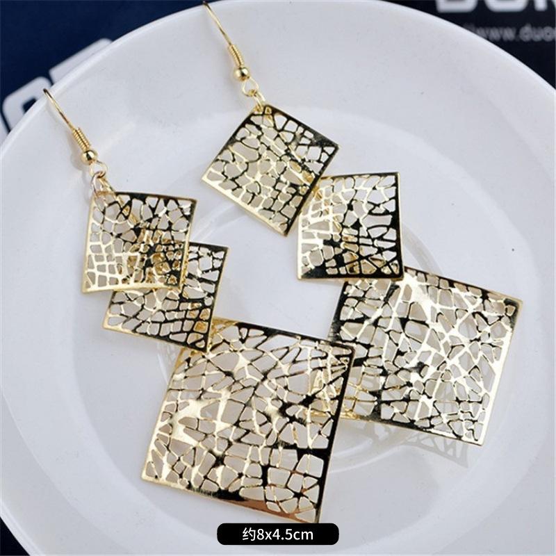 Fashion exaggerated niche temperament fringed earrings retro personality versatile sequined earrings women's long ear jewelry