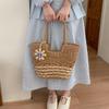 Handwoven Natural Fiber Tote Bag with Braided Handles and Open Weave Design